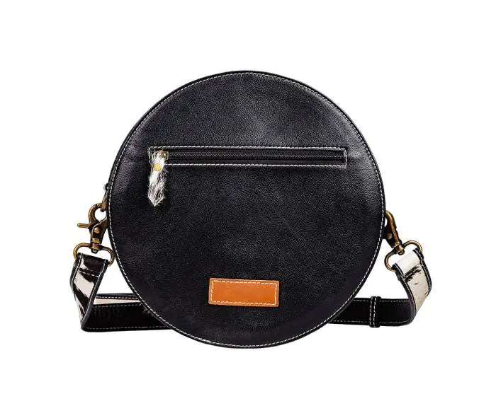 Bloomin' steer hand tooled round bag