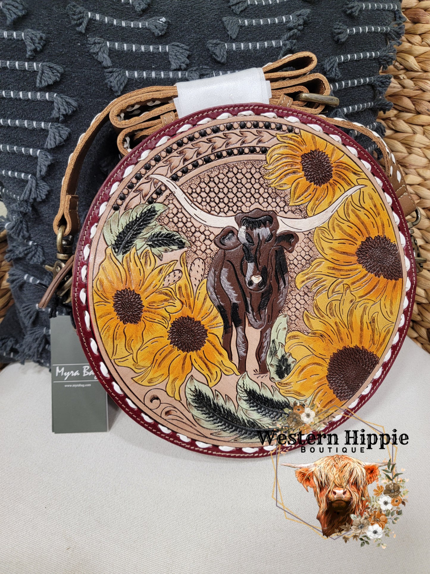 Longhorn ridge hand tooled round bag