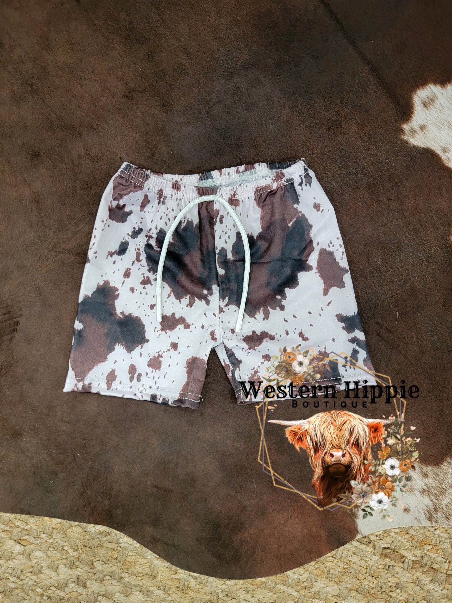 Cow print swim shorts